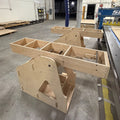 Both Sheet Flipper wings pushed level beside a ShopSabre IS510 CNC table