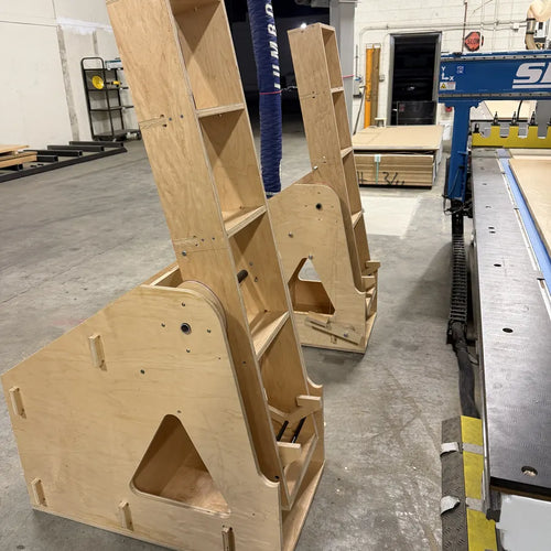 Both flipper stands at rest with wings standing at 80 degrees next to the CNC table
